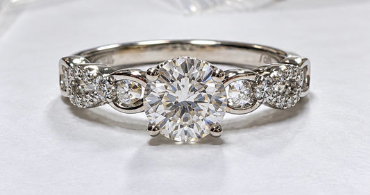 18kw Elma Gil .71 Center Round Diamond .15 ct tw Semi Mount Ring